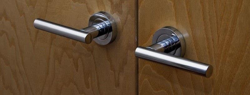 Oscar Lever On Rose Door Handle - Polished Stainless Steel (Pair)