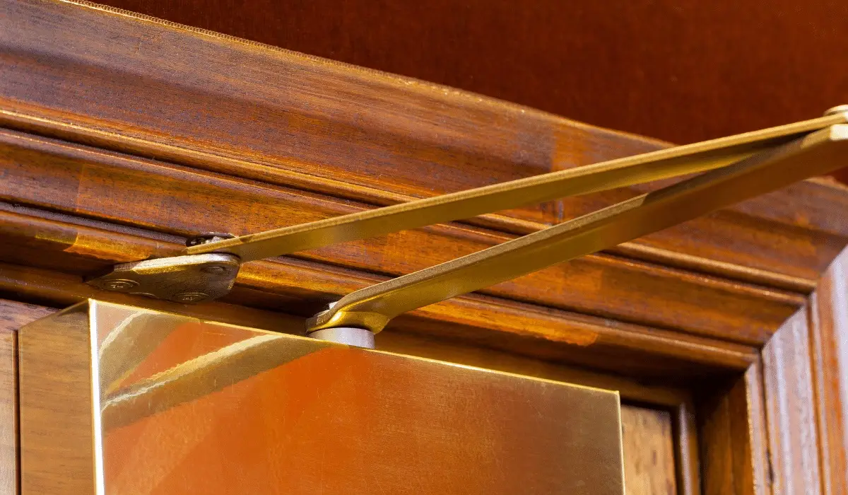 Overhead door closer on a wooden door