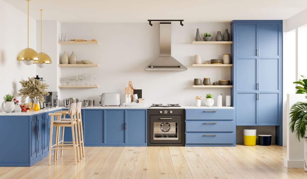Modern kitchen with blue shaker cabinets
